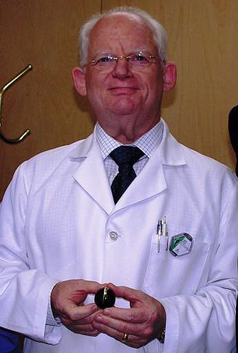 AGTA gemologist Garry Dutoit holding the �Eye of the Lion�
