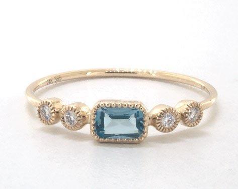 14K Yellow Gold Dainty Blue Topaz Bezel Diamond Ring by Brevani