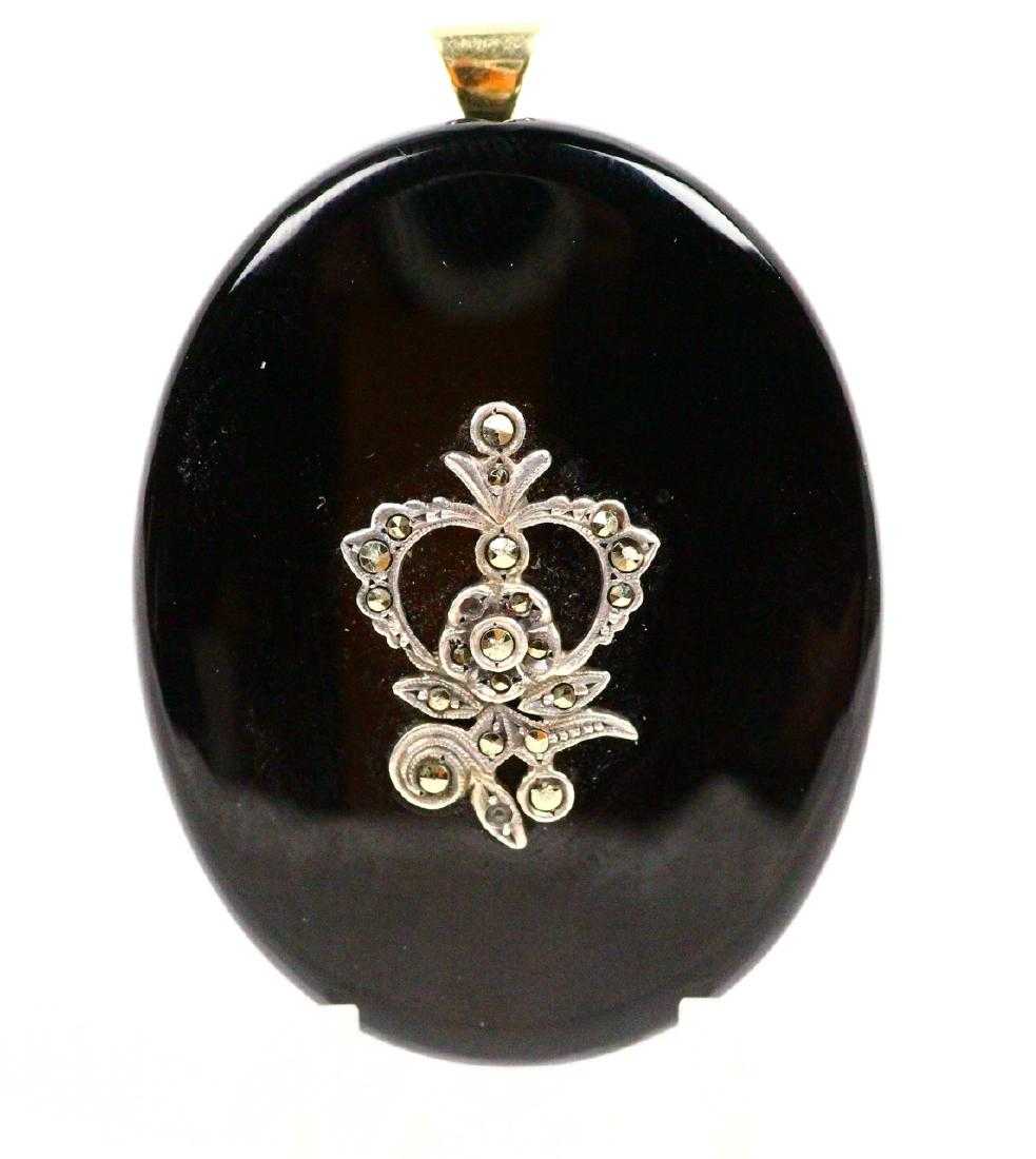 Victorian onyx and marcasite mourning jewelry