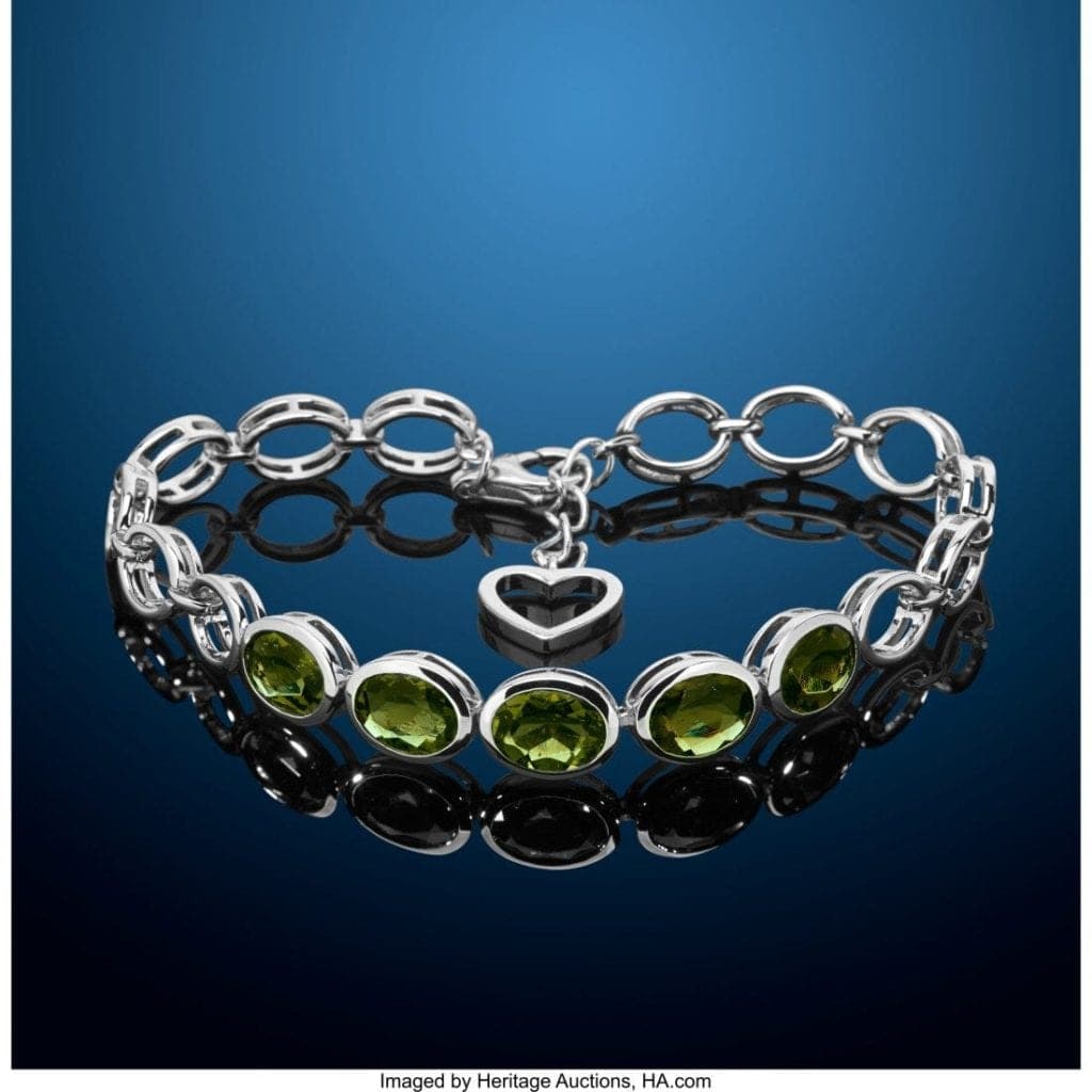 oval-cut moldavites in a bracelet