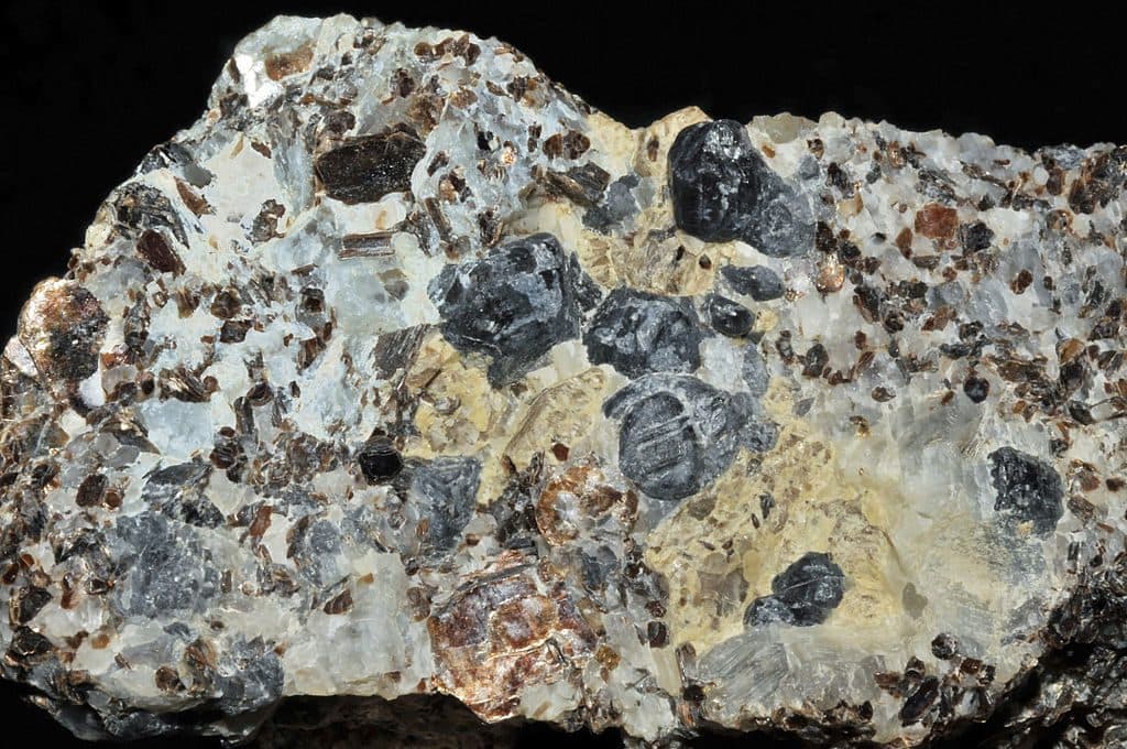 sapphirine and muscovite crystals