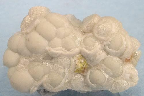 brucite on matrix, white light - South Africa