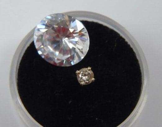 diamond earring and loose synthetic diamond