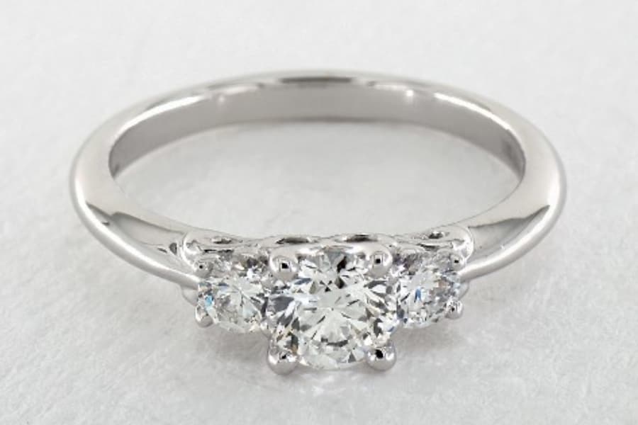 D in three stone ring