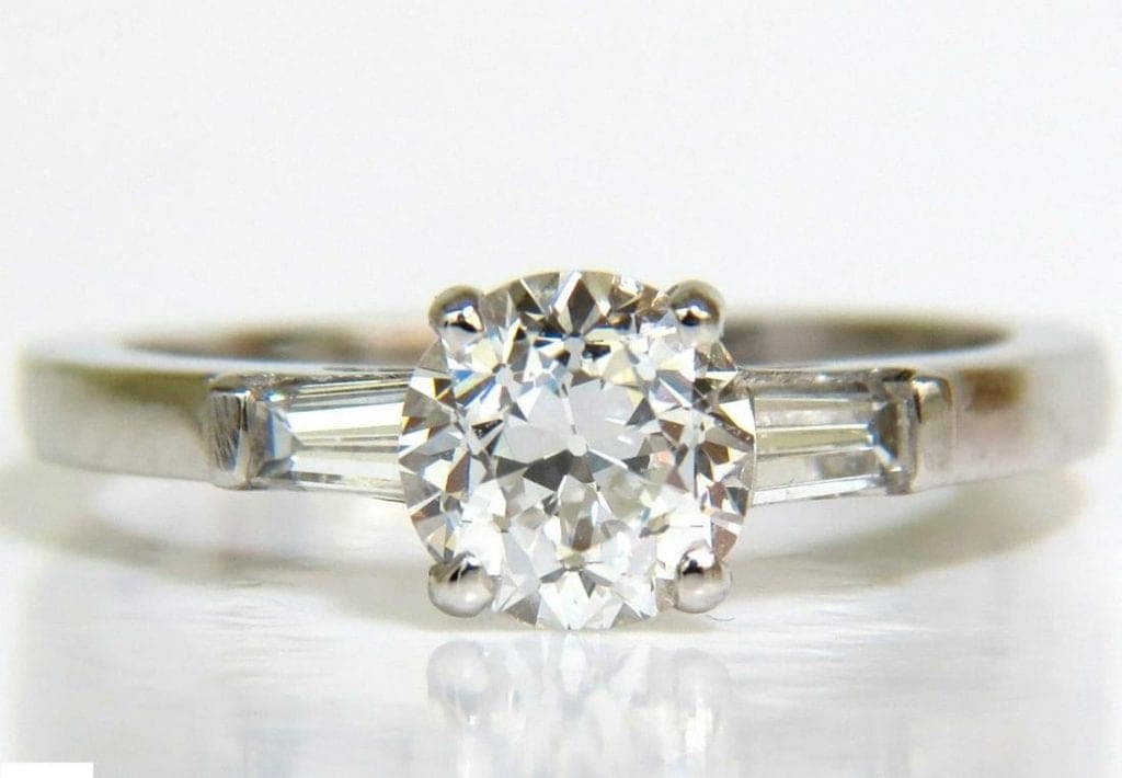 F color OEC diamond in white gold ring