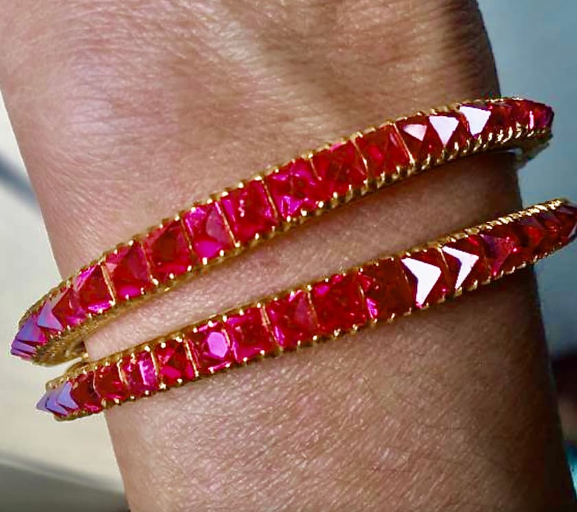 matched pair of gold bracelets with Jedi spinel crystals