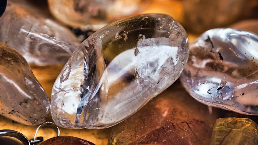 Polished quartz crystals with internal fractures and natural inclusions