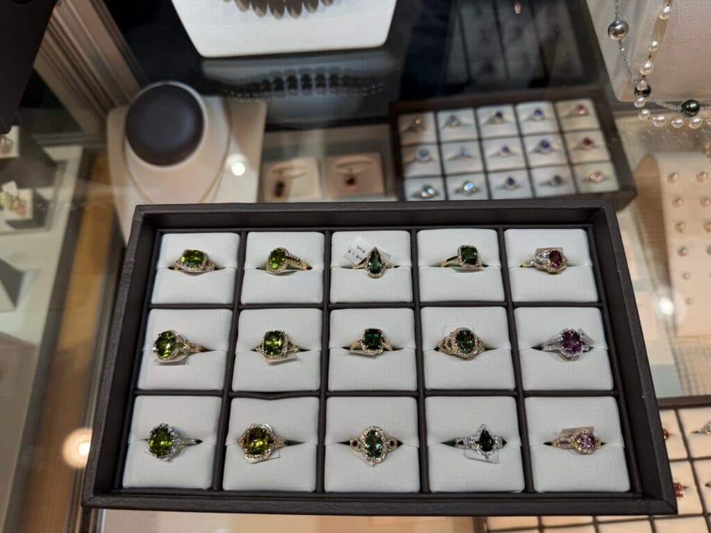 Jewelry by ASBA featuring peridot, green and pink tourmaline, and diamonds.