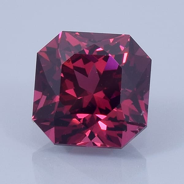 Finished version of Brilliant Square Cut Rhodolite Garnet