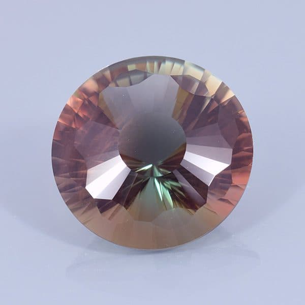 Finished version of Custom 32-sided Round Cut Oregon Sunstone