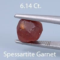 Rough version of Fancy Round Brilliant Cut Spessartite Garnet
