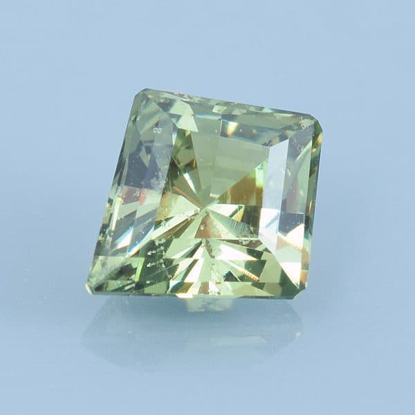 Finished version of Barion Kite Cut Demantoid Garnet