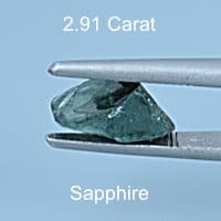 Rough version of Custom Triangular Freeform Cut Sapphire