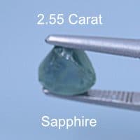 Rough version of Radiant Step Triangle Cut Sapphire