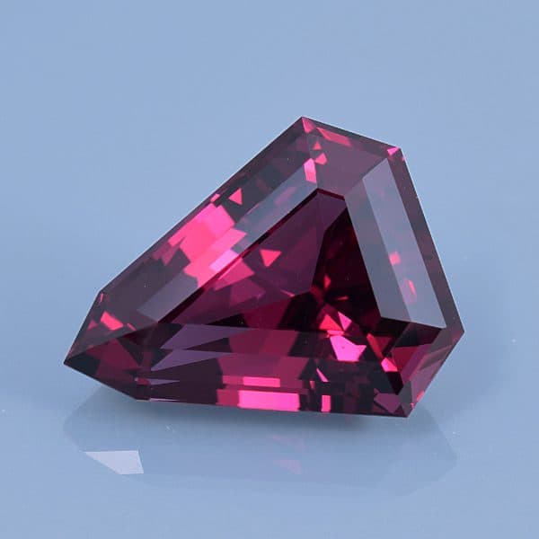 Finished version of Custom Step Arrowhead Cut Rhodolite Garnet