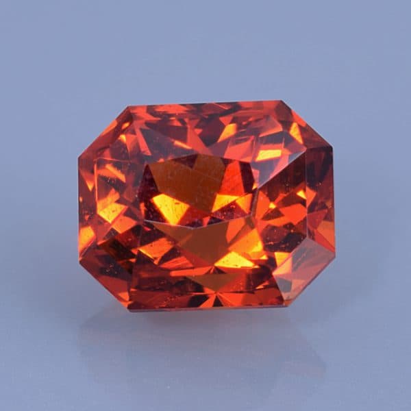 Finished version of Custom Emerald Cut Spessartite Garnet