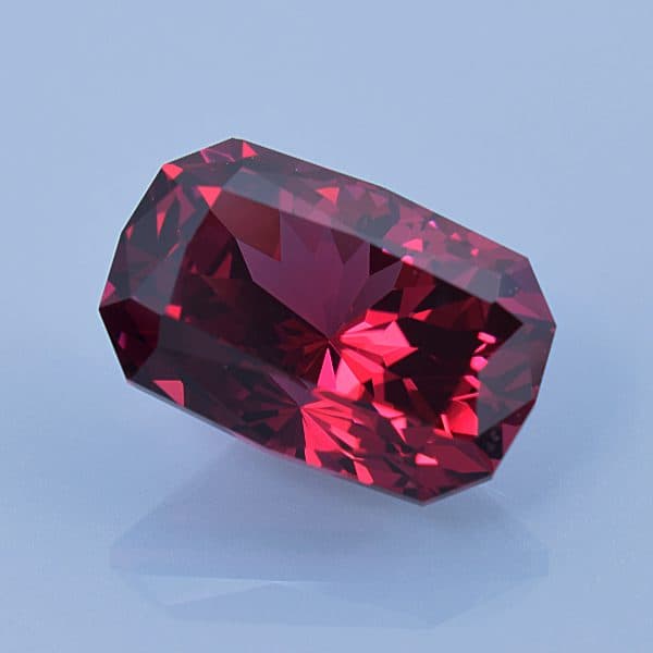 Finished version of Custom Portuguese Cushion Emerald Cut Rhodolite Garnet