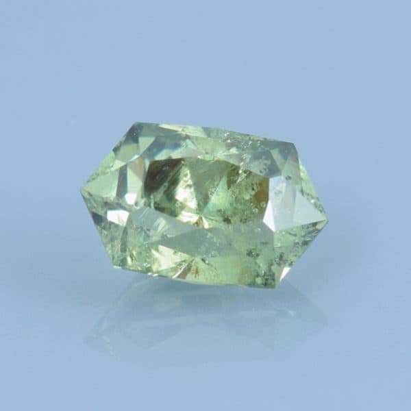 Finished version of Custom Cushion Hexagon Cut Demantoid Garnet