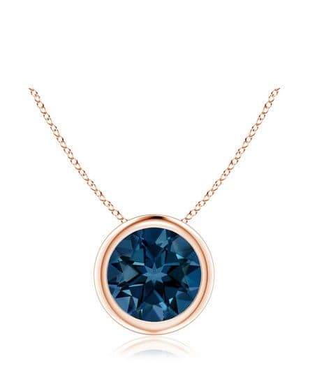 Example of December Birthstones: Bezel-Set Round London Blue Topaz Solitaire Pendant Angara
