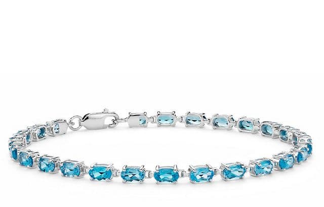 Example of December Birthstones: Petite Swiss Blue Topaz Oval Bracelet in Sterling Silver Blue Nile