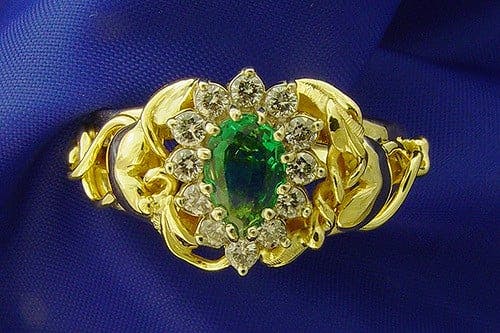 gold, emerald, and diamond ring - gemstone collection