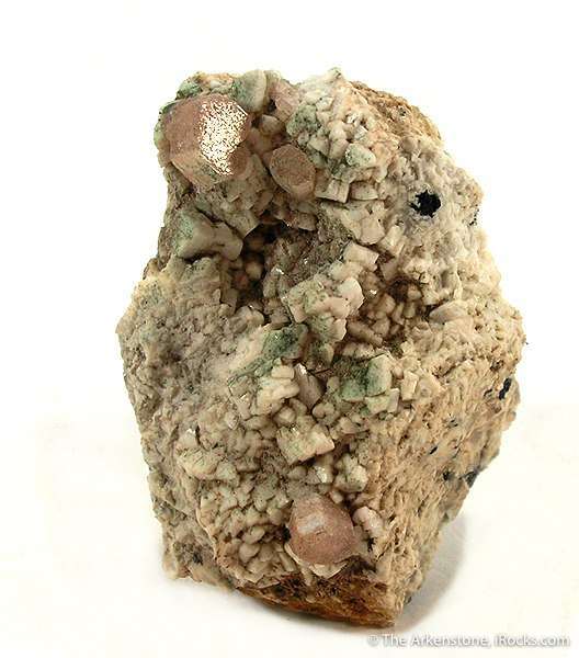 zektzerite crystals on matrix