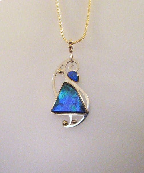ammolite buying guide - blue ammolite pendant