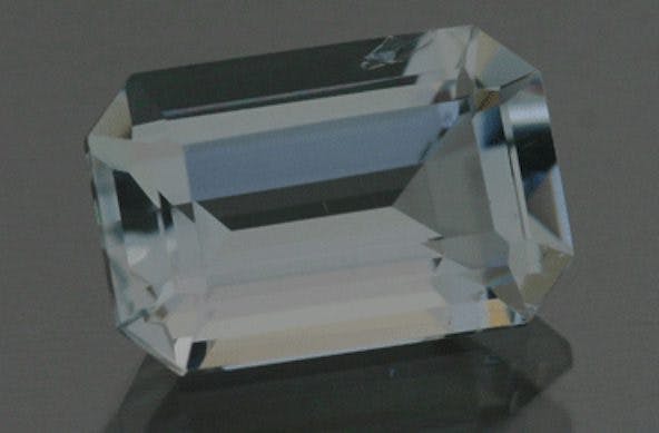 tenebrescent scapolite - colorless - phenomenal gems