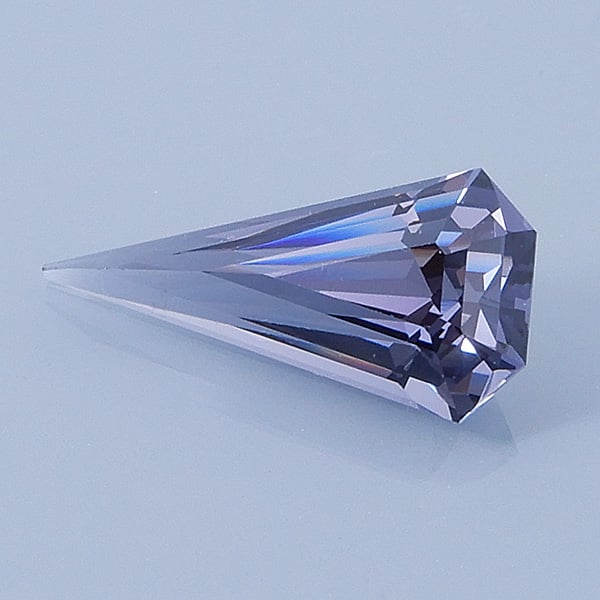 Finished version of Elongated Step Cut Triangle Cut Spinel