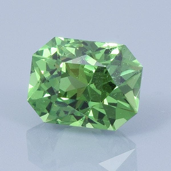 Finished version of Brilliant Emerald Cut Grossular Garnet