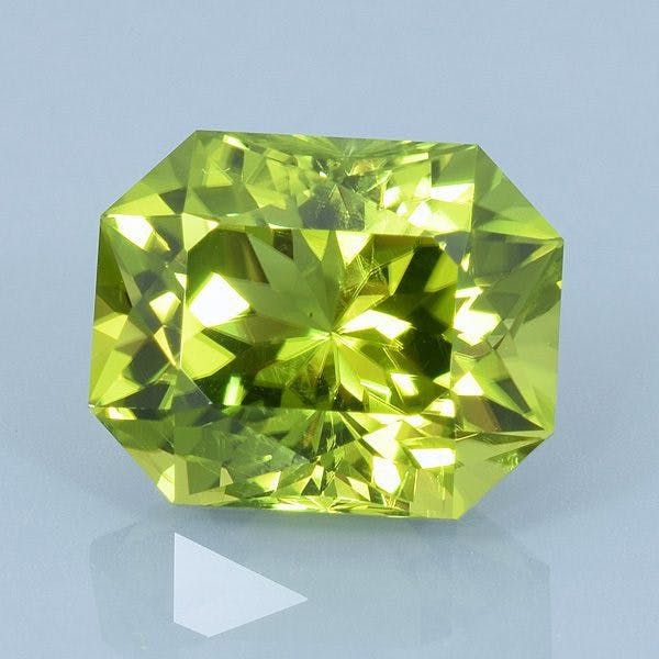 Finished version of Fancy Brilliant Emerald Cut Peridot