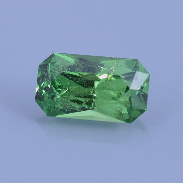 Finished version of Custom Emerald Cut Tsavorite Green Grossular Garnet
