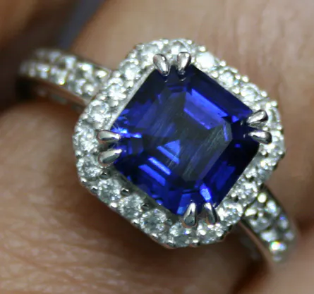 blue sapphire with halo ring setting