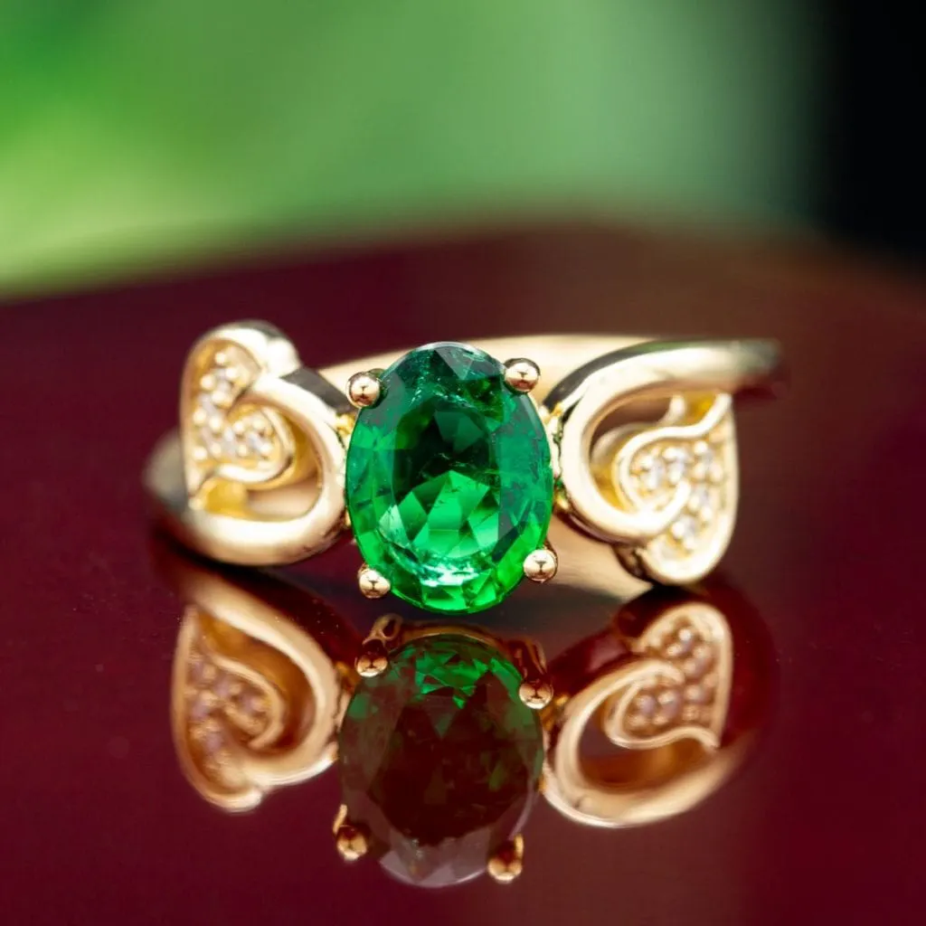 gold and emerald ring