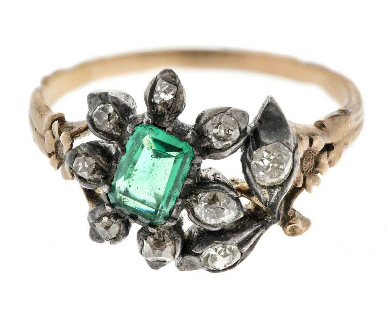gold ring with table-cut emerald