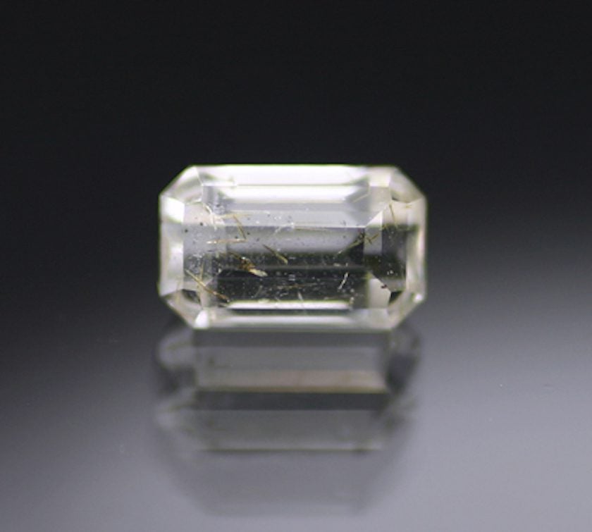 phenakite with perettiite inclusions - uncommon elements uncommon gemstones