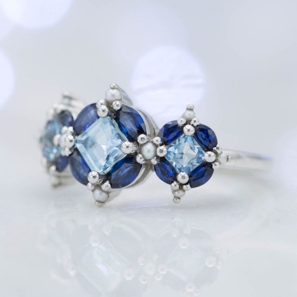 custom aquamarine, sapphire, and pearl ring