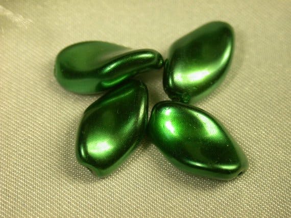green beads with pearly luster - glass gemstones
