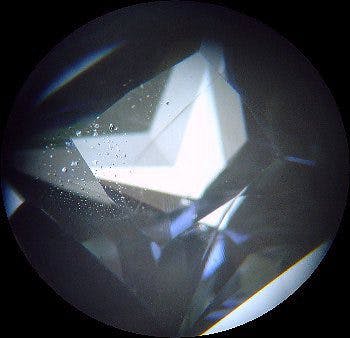 identifying inclusions - blue gemstone