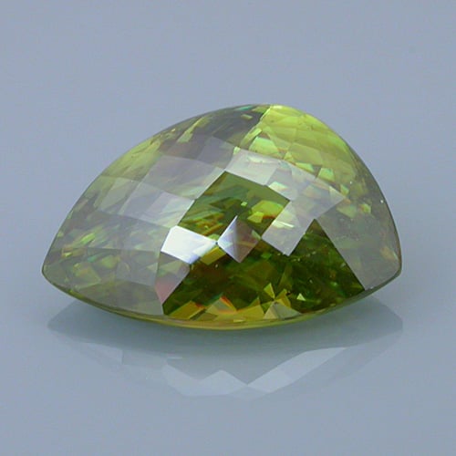 sphene 19 before - repaired and recut gems