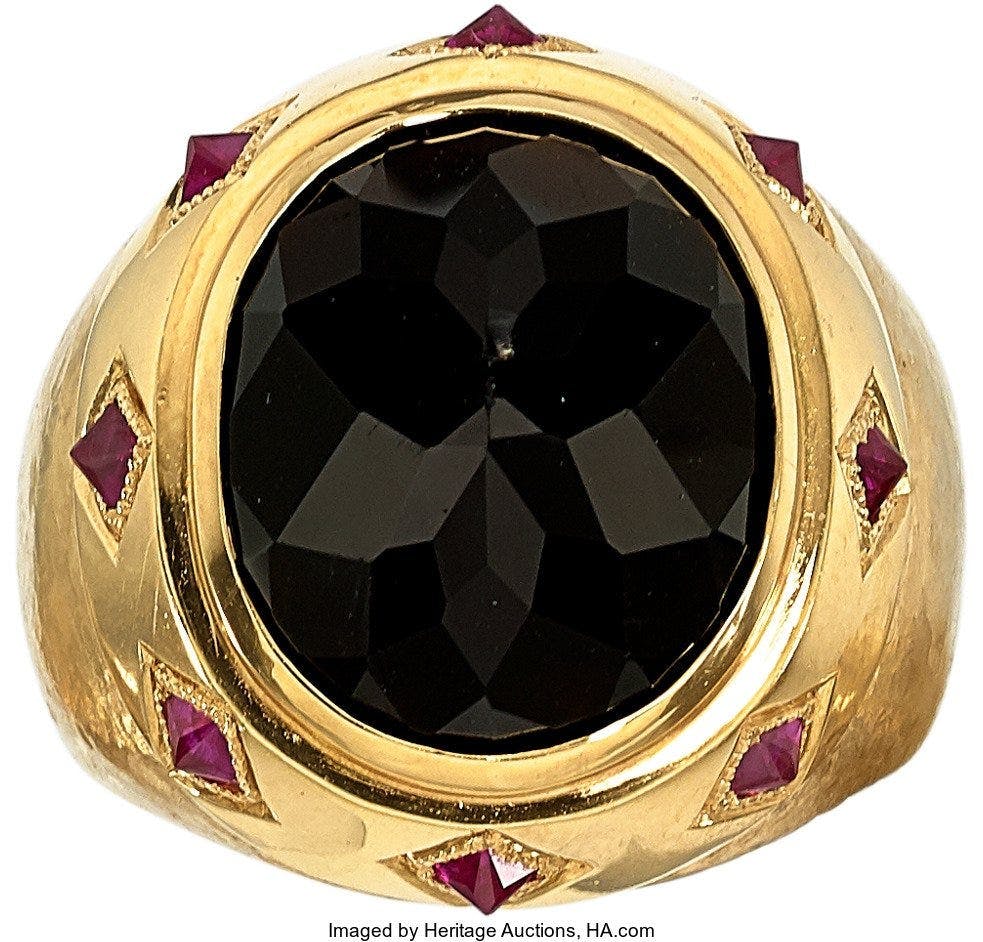 gold ring with tektite and rubies