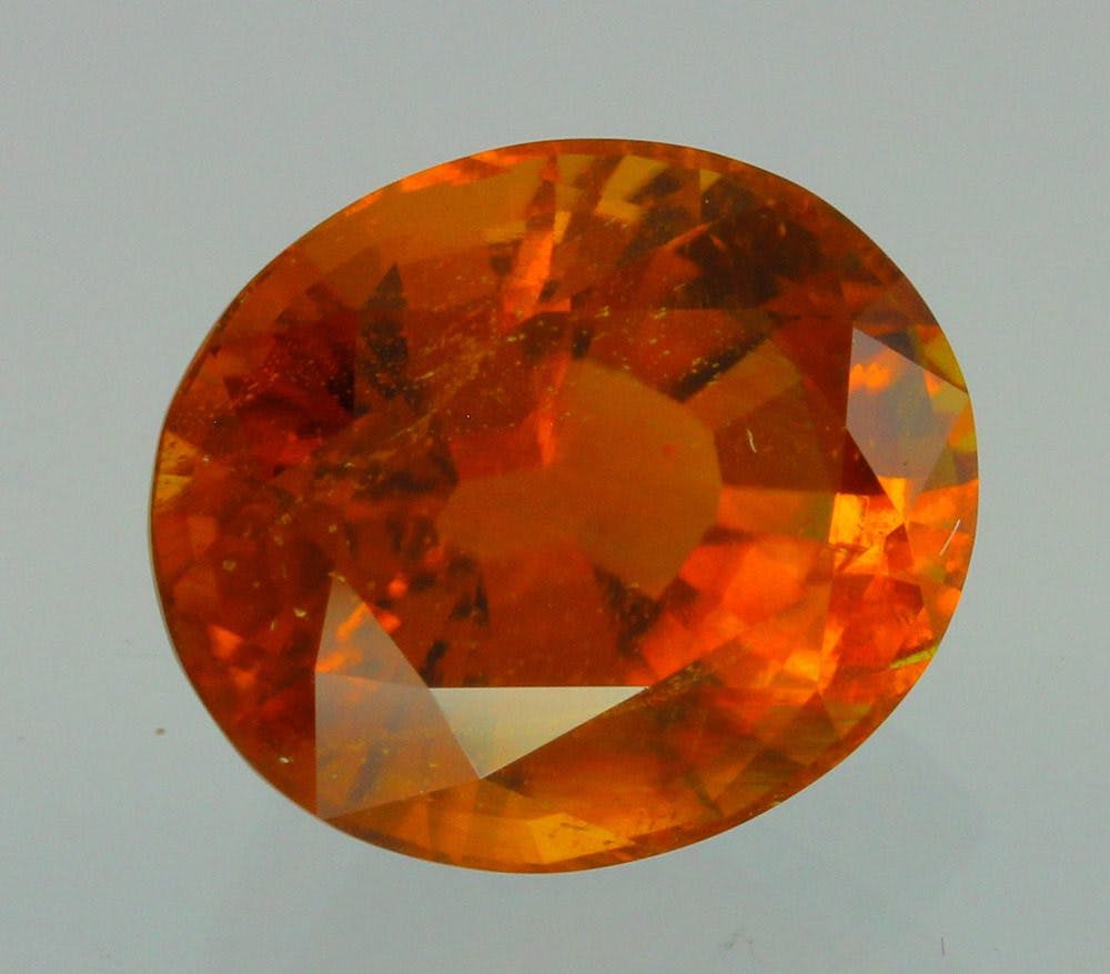 oval-cut clinohumite - Afghanistan