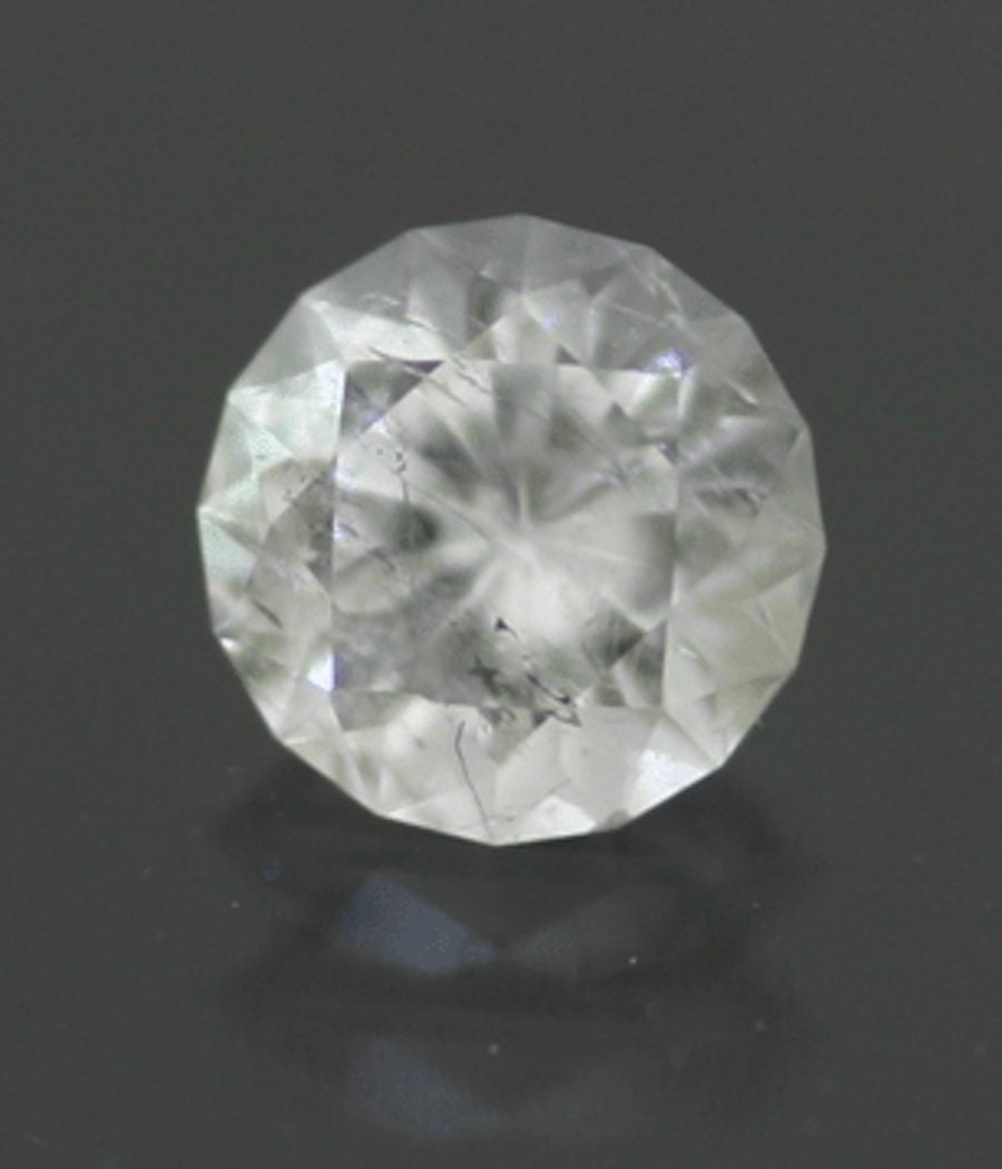 colemanite - round brilliant cut