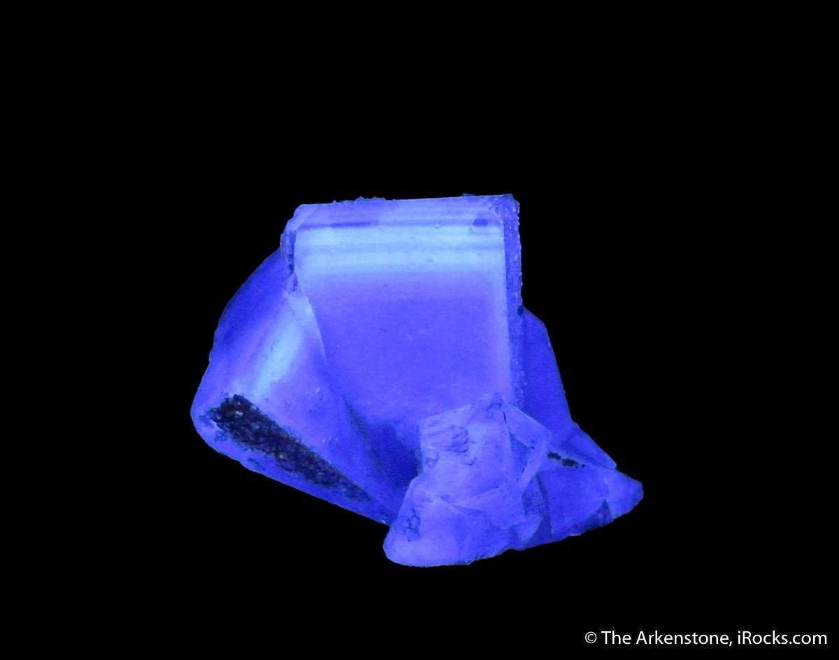 fluorescent fluorite with quartz crystal