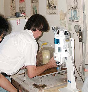 Vacumming the plaster and flask to remove air bubbles