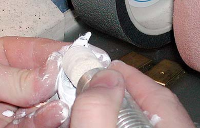 Polishing the Arizona black jade pendant - closeup