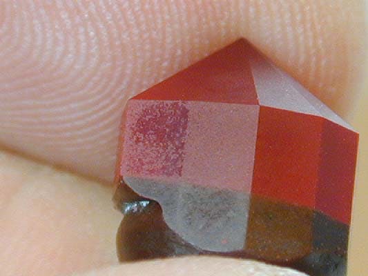 Typical corundum pitting - heart ruby