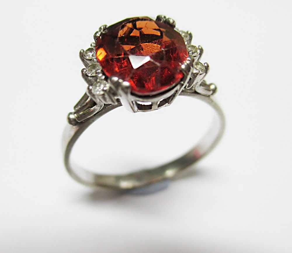 spessartite and diamond ring