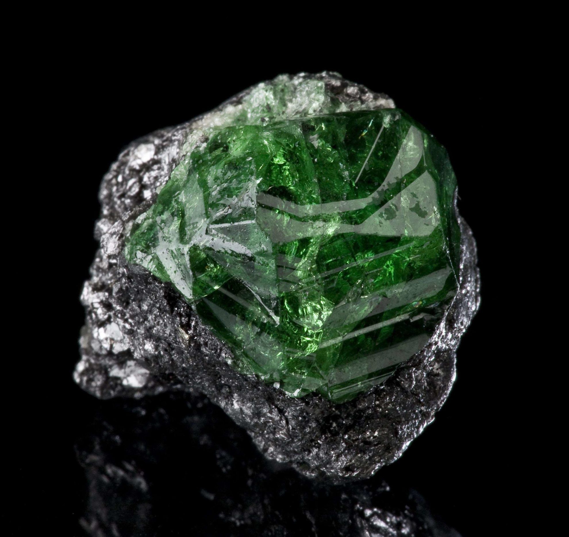 “Tsavorite Garnet on graphite,” Merelani Hills, Lelatema Mts, Arusha Region, Tanzania. © Rob Lavinsky, www.iRocks.com. Used with permission.