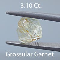Rough version of Fancy Trilliant Cut Grossular Garnet